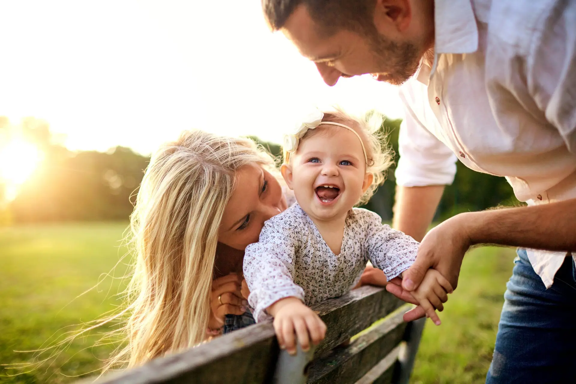 Happy family in a park in summer autumn